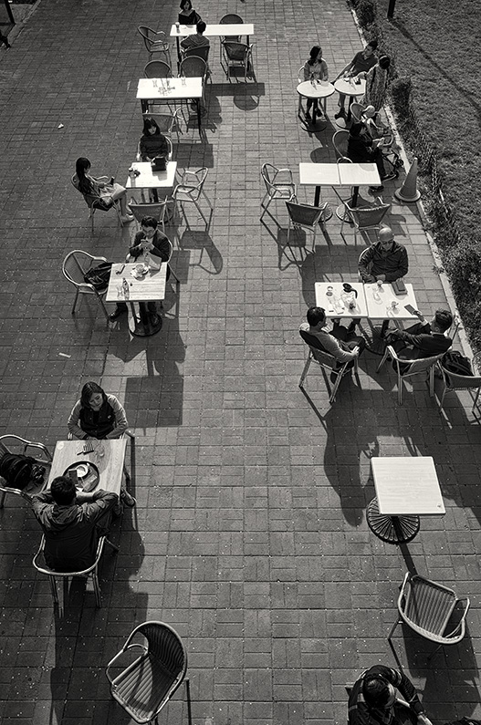 Tables on the terrace of a cafe at the 798 Art District, Dashanzi Art District, Dashanzi, Beijing, China.